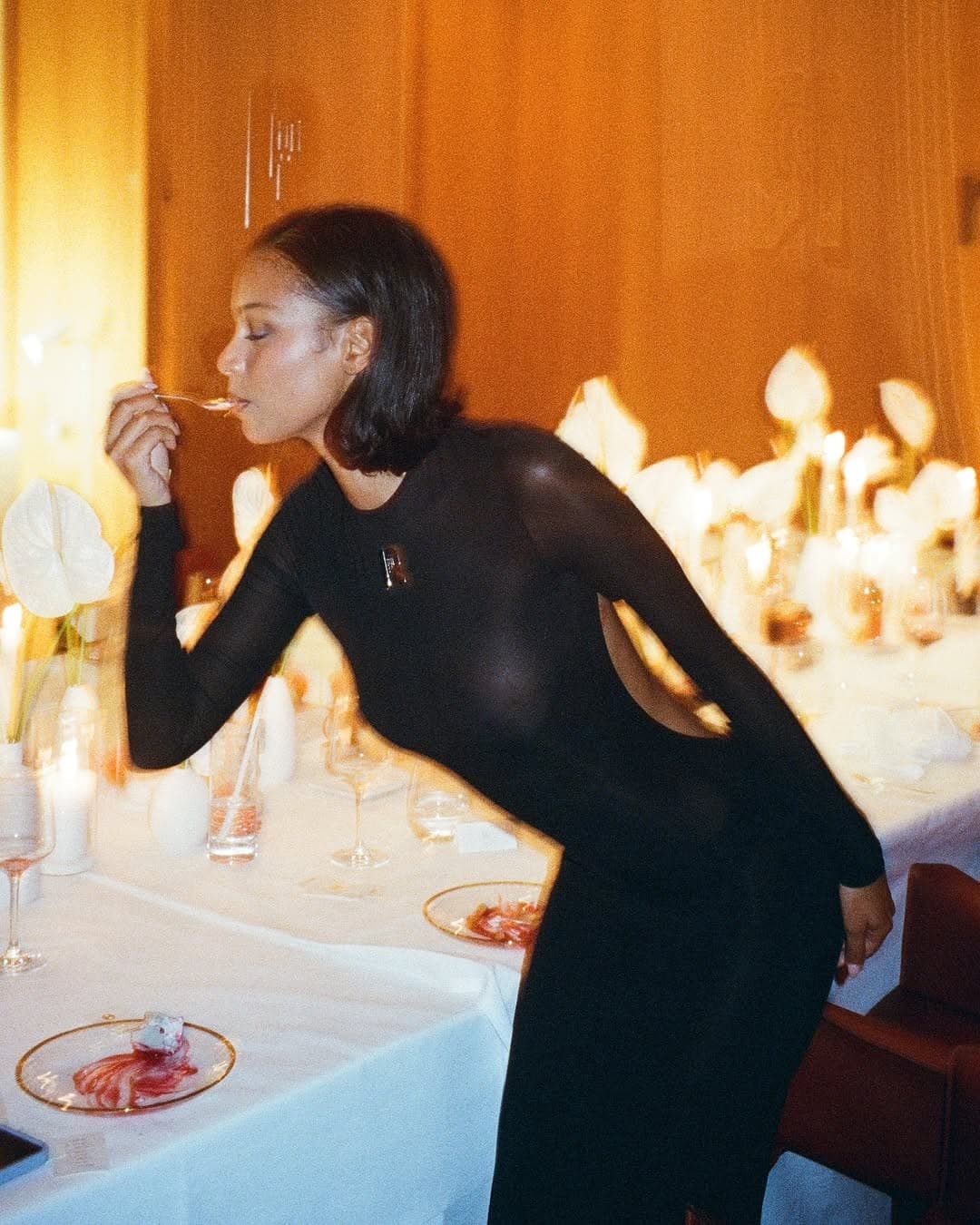 Candlelit centerpiece on a banquet round